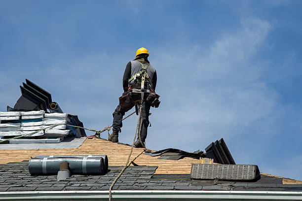 Professional Roof Replacement technician working in New Philadelphia, OH